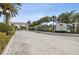 Gated entrance to the prestigious Ashton Pines Yacht & Tennis Club at 116 Wimbledon Ct, Redington Shores, FL 33708