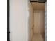 Modern elevator with wood interior and stainless steel accents at 116 Wimbledon Ct, Redington Shores, FL 33708