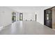 Spacious garage with epoxy floor and ample storage space at 116 Wimbledon Ct, Redington Shores, FL 33708
