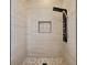 Spa-like shower with multi-function shower head and pebble floor at 116 Wimbledon Ct, Redington Shores, FL 33708