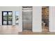 Modern home featuring a convenient interior elevator at 116 Wimbledon Ct, Redington Shores, FL 33708