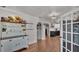 Bright dining room with hardwood floors and charming hutch at 8016 Carey Rd, Lithia, FL 33547