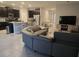Open concept living room with kitchen view at 16988 Oval Rum Dr, Wimauma, FL 33598