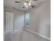 Spacious bedroom featuring a double door closet and large window at 1310 E Tomlin St, Plant City, FL 33563