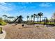 playground with swings and play equipment at 3808 Capri Coast Dr, Plant City, FL 33565