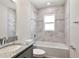 Beautiful bathroom with granite countertops, a soaking tub, and elegant tile work at 7011 161St E Ter, Parrish, FL 34219