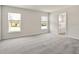 Spacious bedroom with plush carpeting, large windows, and an en-suite bathroom at 7011 161St E Ter, Parrish, FL 34219