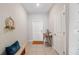 Bright and airy entryway with a decorative console table at 7209 Sweet Alyssum Ct, Tampa, FL 33619