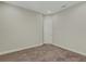 Spacious bedroom with neutral decor and carpeted floor at 10469 Meadowrun Dr, Lithia, FL 33547