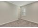 Bright bedroom featuring a window with plantation shutters at 10469 Meadowrun Dr, Lithia, FL 33547
