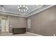 Spacious bedroom with plush carpeting, large windows and dresser at 10469 Meadowrun Dr, Lithia, FL 33547