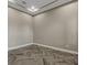 Neutral-toned room with herringbone floors and recessed lighting at 10469 Meadowrun Dr, Lithia, FL 33547