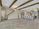 Bright and airy living room with hardwood floors and exposed beams at 10469 Meadowrun Dr, Lithia, FL 33547