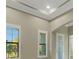 High ceilings with crown molding, recessed lighting and plantation shutters at 10469 Meadowrun Dr, Lithia, FL 33547