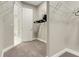 Large walk-in closet with custom shelving and hanging rods at 10469 Meadowrun Dr, Lithia, FL 33547