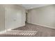 Well-lit bedroom with double doors and carpet flooring at 10469 Meadowrun Dr, Lithia, FL 33547
