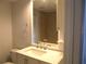 Bathroom featuring modern vanity with sink, mirror, and storage at 5260 42Nd S St, St Petersburg, FL 33711