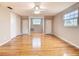Expansive bonus room featuring hardwood floors, natural light, and closet space at 5260 42Nd S St, St Petersburg, FL 33711