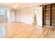 Versatile bonus room with built-in shelving, hardwood floors, and multiple closets at 5260 42Nd S St, St Petersburg, FL 33711