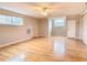 Spacious bonus room with hardwood floors, ample natural light, and built-in storage at 5260 42Nd S St, St Petersburg, FL 33711