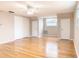 Open bonus room with hardwood floors, ceiling fan, and a large closet at 5260 42Nd S St, St Petersburg, FL 33711