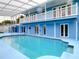 Large pool area with a balcony and access doors on the first and second floor at 5260 42Nd S St, St Petersburg, FL 33711