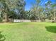 Landscaped backyard offering privacy and tranquility at 8613 Beth Ct, Odessa, FL 33556