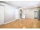 Light-filled bedroom with wood floors and multiple closets at 8613 Beth Ct, Odessa, FL 33556