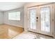 Bright entryway with light flooring and double doors at 8613 Beth Ct, Odessa, FL 33556