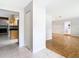 Hallway with tile floors and a view into the living room at 8613 Beth Ct, Odessa, FL 33556