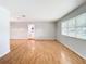 Bright living room with wood flooring and large windows at 8613 Beth Ct, Odessa, FL 33556
