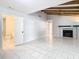 Spacious living room with fireplace and high ceilings at 8613 Beth Ct, Odessa, FL 33556