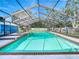 Screened-in pool perfect for relaxation and enjoyment at 8613 Beth Ct, Odessa, FL 33556