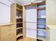 Large walk-in closet with ample shelving and drawers at 8613 Beth Ct, Odessa, FL 33556