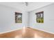 Spacious bedroom with large window and hardwood floors at 4317 S Trask St, Tampa, FL 33611
