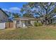 House exterior showcasing a well-maintained lawn at 4317 S Trask St, Tampa, FL 33611