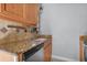 Spacious kitchen featuring granite countertops and stainless steel appliances at 4317 S Trask St, Tampa, FL 33611