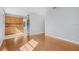 Open living space next to the kitchen features new laminate flooring at 4317 S Trask St, Tampa, FL 33611