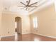 Bedroom featuring neutral walls, a fan, and hardwood floors at 2638 E Knights Griffin Rd Rd, Plant City, FL 33565