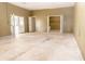 This is a large garage space with an additional storage or workspace area at 2638 E Knights Griffin Rd Rd, Plant City, FL 33565