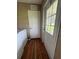 Functional laundry area with a door to the outside and a vent for ventilation at 2638 E Knights Griffin Rd Rd, Plant City, FL 33565