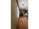 Spacious living room featuring hardwood floors and natural light coming from the window at 2638 E Knights Griffin Rd Rd, Plant City, FL 33565
