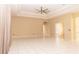Large living room with tile floors, high ceilings, and abundant natural light at 2638 E Knights Griffin Rd Rd, Plant City, FL 33565
