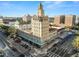 High-rise building in a city setting with surrounding structures and roads at 405 Central Ave # 210, St Petersburg, FL 33701