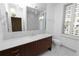 Bathroom with marble vanity and walk-in shower at 405 Central Ave # 210, St Petersburg, FL 33701
