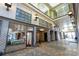 Elegant building lobby with high ceilings, skylights, and tiled floors at 405 Central Ave # 210, St Petersburg, FL 33701