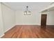 Elegant dining room with hardwood floors and access to entryway at 405 Central Ave # 210, St Petersburg, FL 33701