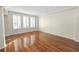 Bright living room with hardwood floors and large windows at 405 Central Ave # 210, St Petersburg, FL 33701