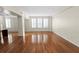 Bright and airy living room with hardwood floors and large windows at 405 Central Ave # 210, St Petersburg, FL 33701