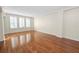 Spacious living area with hardwood floors and abundant natural light at 405 Central Ave # 210, St Petersburg, FL 33701